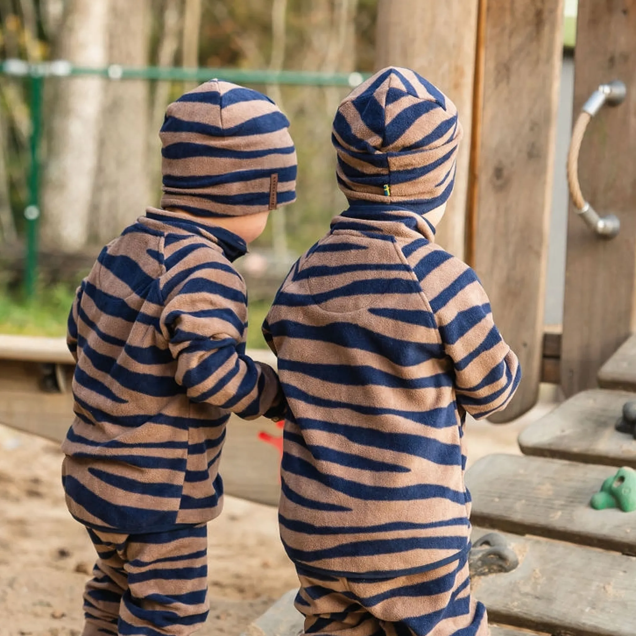 Barn Geggamoja Vintermössor<Fleecemössa Zebra Blå/Brun